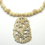 carved bone necklace with pendant