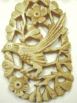 carved bone pendant