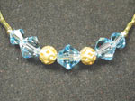 #286 in gold and aquamarine