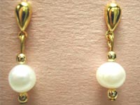 white pearl and gold earrings